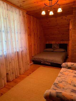 Дома для отпуска Охотничий дом с альтанкой Borovka Дом с 2 спальнями-22